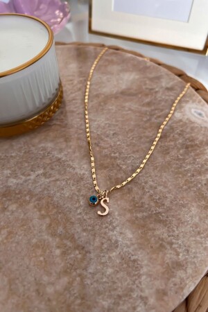 Dünne Halskette mit S-Buchstaben und Evil Eye-Anhänger - Trendy Butik