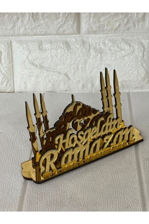 Goldener Serviettenhalter aus Plexiglas mit der Aufschrift „Welcome Ramadan“. - Genel Markalar