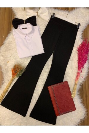 Hose mit ausgestelltem Bein in Schwarz - Trendbutik