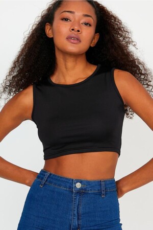 Schwarzes Sport-Crop-Top aus Scuba-Stoff mit Rundhalsausschnitt für Damen - The Base